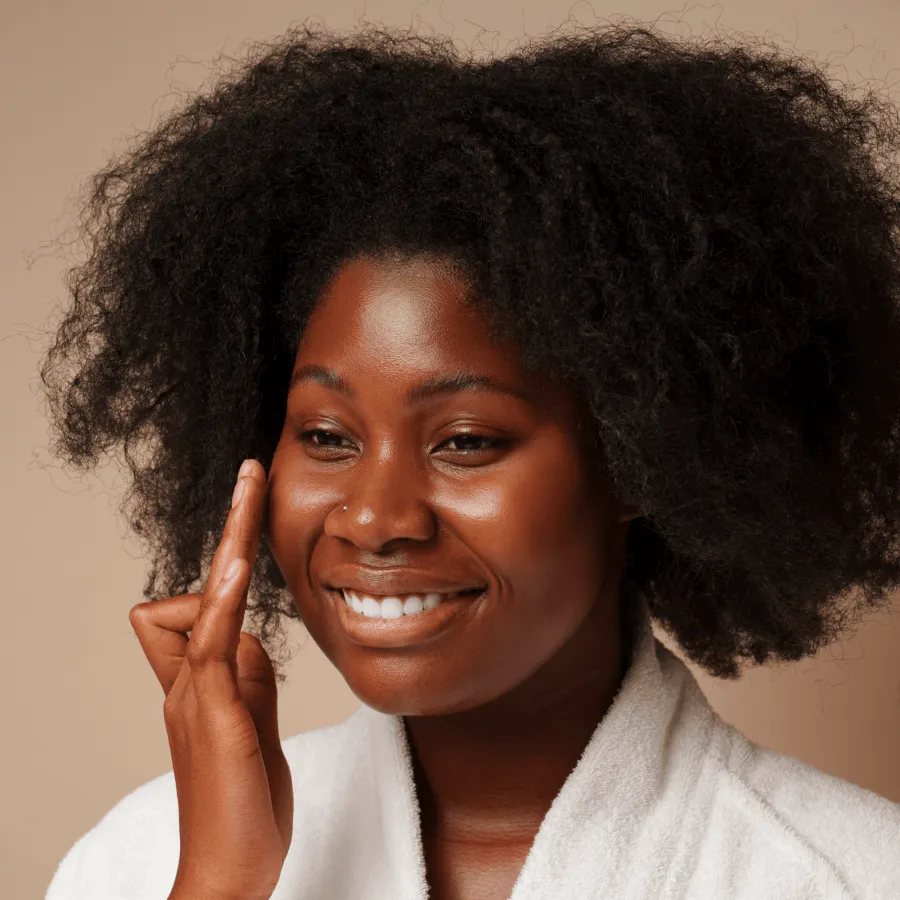 Woman applying skincare